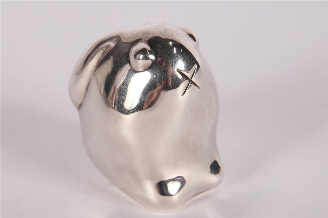 Christofle, Silver Plated Bunny Paperweight: Christofle (French, established 1830). Silver plate. Height: 2 1/2", Length: 2", Depth: 1". Figural silver plated paperweight in the form of a rabbit. Marked "Christofle" with designer hallmarks at