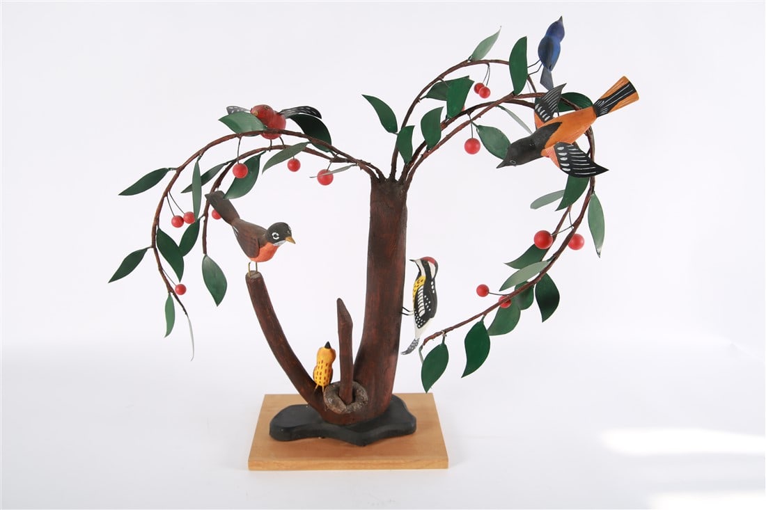 Folk Art Carved Wood Tree with Birds: Carved and painted wood, tape, metal. Height: 29 1/2", Length: 30", Depth: 17". Carved and painted wood folk art tree with several birds attached. Appears unsigned.
