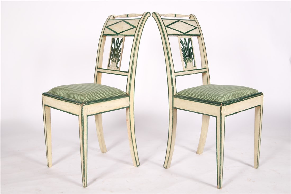 Pair of French Neoclassical Style Chairs: Wood, fabric. Height: 34 1/2", Length: 16 1/4", Depth: 14". Matching pair of green and white French Neoclassical style chairs with green and white cushions.