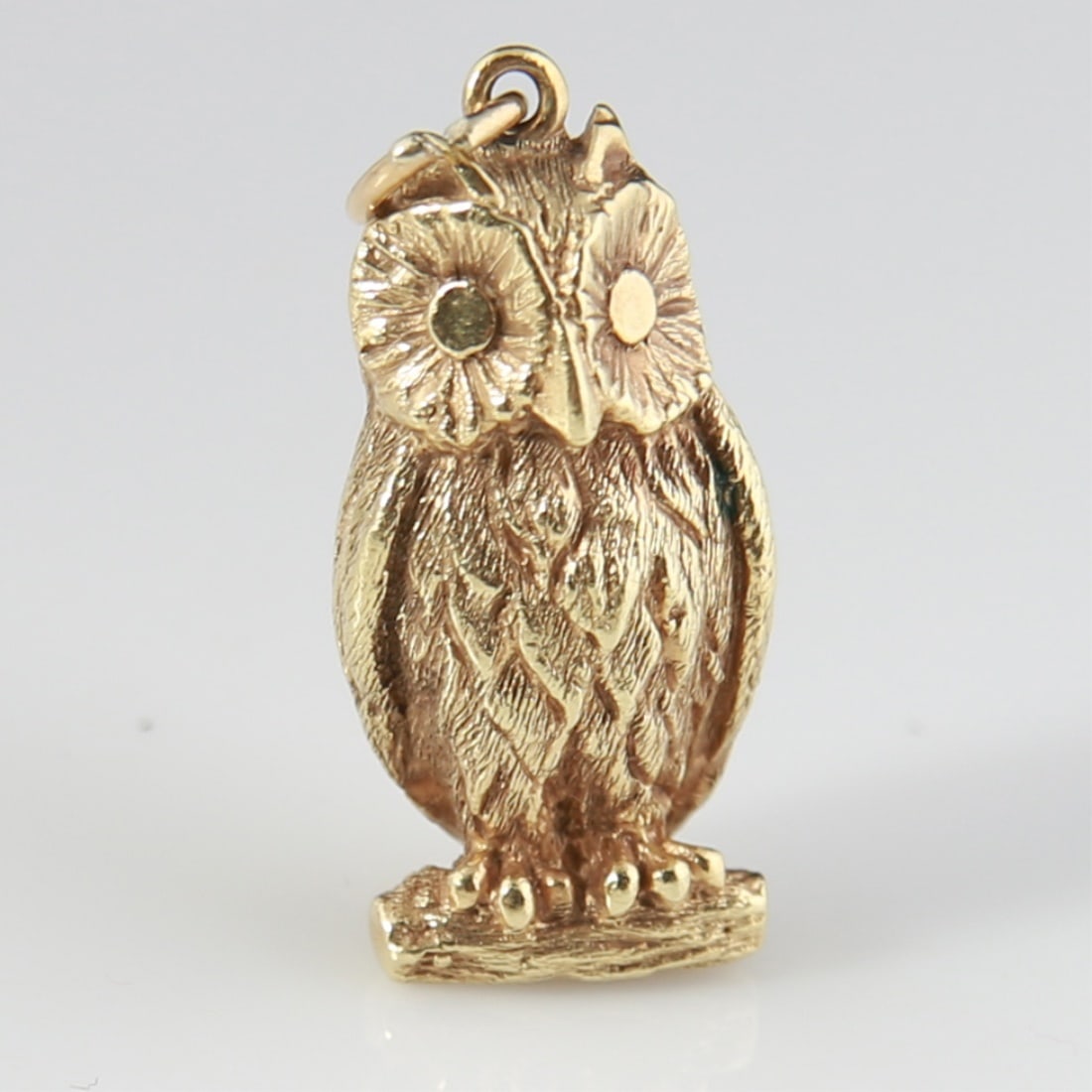 14k Yellow Gold Owl Charm: 14k yellow gold. 1" x 3/8" x 1/4". Weight: 6.5g. 14k yellow gold owl charm. Unmarked, tests as 14k.