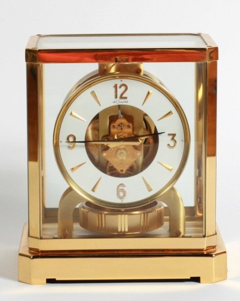 Le Coultre Brass Atmos Clock, Swiss, 20th C.: Le Coultre brass and Plexiglass atmos clock. Swiss, 20th century. Square glazed case centering an Arabic and dash dial. Height 9", width 7 1/2", depth 5 1/4". Condition: We do not know if it is in wor