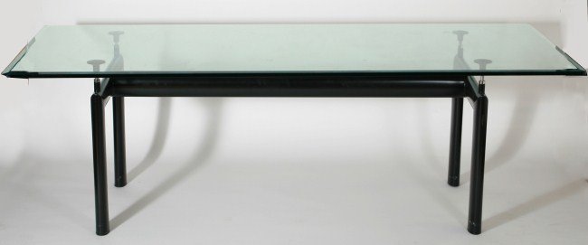 Le Corbusier LC6 Metal and Glass Dining Table: Le Corbusier LC6 metal and glass dining table. 20th century. Dining table with rectangular glass top over black painted steel base with adjustable legs. Made by Cassina, designed by Le Corbusier, Pier
