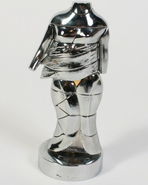 Miguel Berrocal (1933-2006), Puzzle Sculpture: Miguel Berrocal (Spanish, 1933-2006). Classical figure puzzle sculpture. Chromed steel. Signed lower front, numbered "3490" lower back. Height 6".