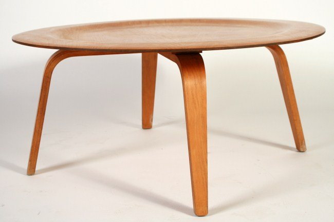 Eames Dish Table, C. 1940: Charles and Ray Eames dish table. American, circa 1940. Having birch plywood top over splayed legs. Unmarked. Height 15 3/4", diameter 34".