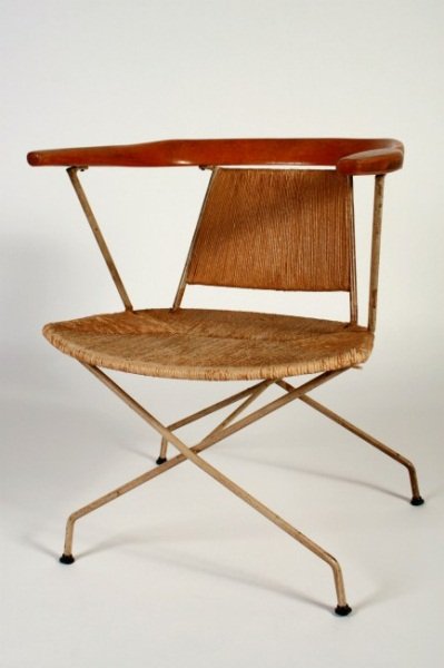 Mid-Century Armchair Attrib. to Hans Wegner: Mid-century teak and woven rush armchair. Danish, mid-century. Attributed to Hans Wegner. Teak "cowhorn" arms supported by woven rush seat and back supported by a wrought iron base. Height 26 1/4", wi
