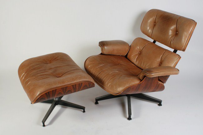 Eames 670/671 Lounge and Ottoman, C. 1970: Charles and Ray Eames 670/671 lounge and ottoman set. American, circa 1970. Laminated rosewood with caramel leather upholstery back and seat with polished and enameled aluminum fastenings. Both with b