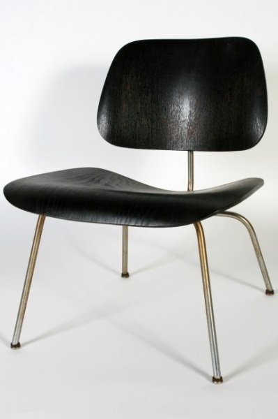 Charles and Ray Eames LCM Lounge Chair: Charles and Ray Eames LCM Lounge Chair. American, 20th century. Designed by Herman Miller. Ebonized plywood seat and back on a chrome frame. Stamped "LCM" under seat. Height 26 1/2", width 22", depth 