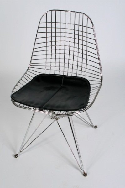 Charles and Ray Eames DKR Chair by Herman Miller: Charles and Ray Eames DKR chair. American, 20th century. Made by Herman Miller. Metal wire frame over Eiffel Tower base with black leather seat pad. Height 32", width 18 1/2", depth 17 1/2".