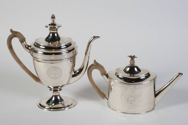George III Silver Teapot and Coffee Pot, 44.6 Ozt.: George III silver teapot and coffee pot. Scottish, early 19th century. Including a Wiliam & Patrick Cunningham teapot and a McHattie & Fenwick coffee pot. Teapot having chased foliate decoration and a
