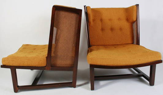 Pair Wormley Wingback Lounge Chairs, Model 6016: Pair Edward Wormley upholstered wingback lounge chairs, model 6016. American, circa 1958. Made by Dunbar. Mahogany frame with tufted upholstered seat and back, encased in cane panels. Signed with Dunb