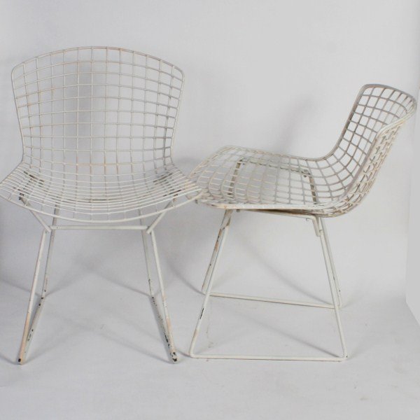 Pair Harry Bertoia for Knoll Wire Side Chairs: Pair Harry Bertoia for Knoll wire side chairs. American, circa 1960. White painted coated metal wire chairs. With unoriginal cushions. Unmarked.
