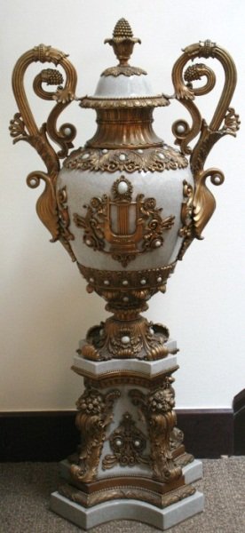 Mounted Porcelain and Ormolu Decorative Urn: Mounted porcelain and ormolu decorative urn. 19th century. Decorative porcelain urn having crackle glaze and ovoid form with acanthus foliate design. Centered lyres on each side surrounded by foliate