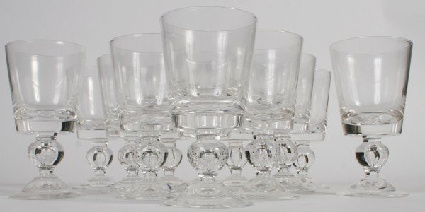 12 Steuben Goblets, #7926, by George Thompson: Twelve Steuben goblets, #7926. American, circa 1958. Teardrop goblets with squared bowl. Designed by George Thompson. Signed underfoot. In original fitted box. Height 6 1/2".