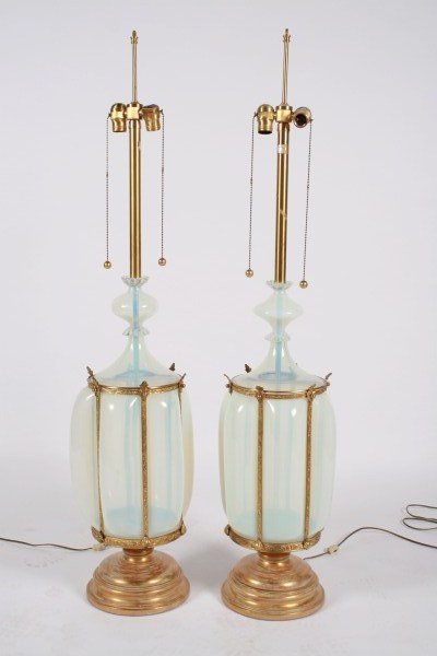 Pair Barovier Murano Glass Table Lamps by Marbro: Pair of Barovier Murano glass table lamps. 20th century. Made by Marbro Lamp Company. Pair of table lamps of semi-transparent iridescent glass with encompassing gilt metal frameworks. Along with two o
