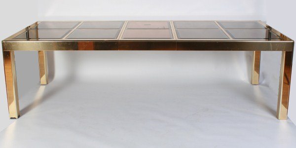Mastercraft Extendable Dining Table: Mastercraft brass extendable dining table with beveled smoked glass and bronze-tinted mirrored panel inserts. American, 20th century. Designed by William Doezema. Parsons style brass extendable dining