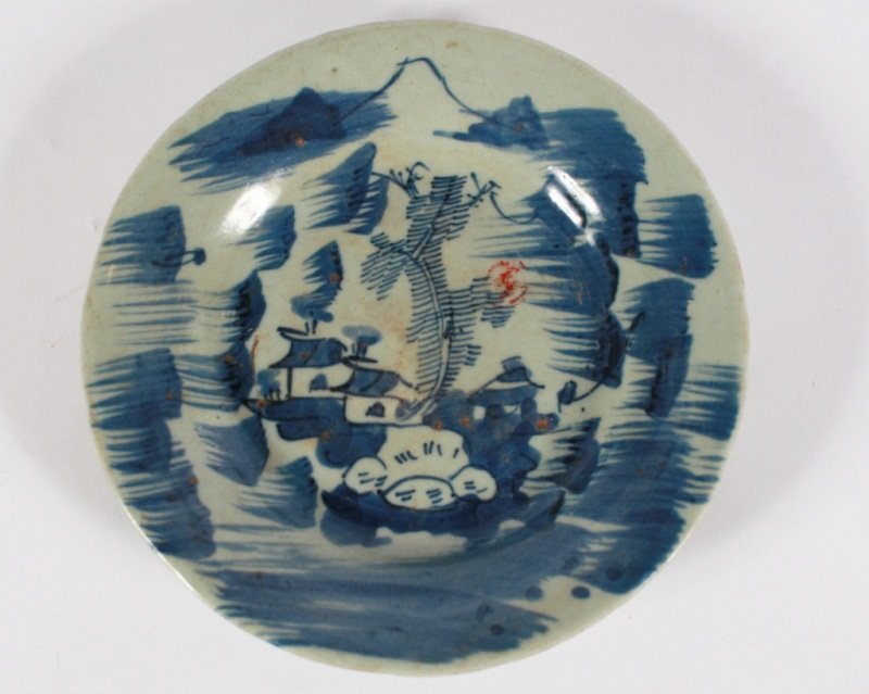 Chinese T'ung Chih Porcelain Plate, 19th C.: Chinese T'ung Chih porcelain plate. 19th century. Base with "Ch'ing Dynasty 1862-1874 T'ung Chih Period" label and marked with Chinese characters. Along with wood stand. Diameter 9".