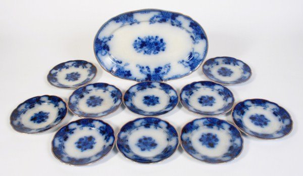 Burgess & Campbell Royal Blue China Partial Set: Partial set of Burgess & Campbell flow blue china in the Royal Blue or Balmoral pattern. Late 19th century. With 11 piecies, including: 1 serving platter and 10 dessert plates. All pieces marked eithe