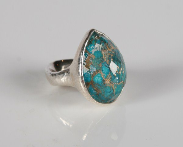 Ippolita Wonderland Turquoise Teardrop Ring: Ippolita Wonderland Teardrop ring. 20th century. Sterling silver ring set with veined turquoise teardrop doublet with a clear quartz overlay. Total weight 21.2 grams.