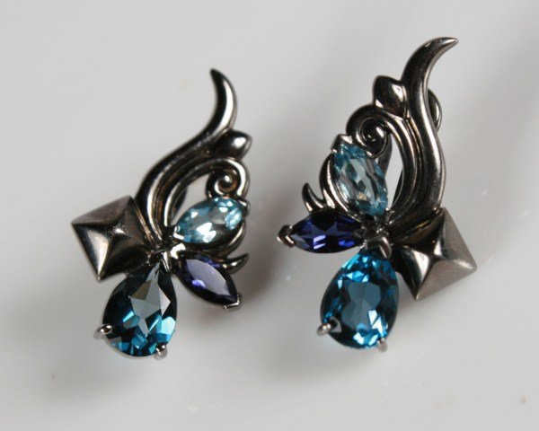 Stephen Webster Pop Superstud Earrings: Stephen Webster Pop Superstud rhodium plated sterling silver earrings set with blue topaz and iolite. 20th century. Total weight 12.8 grams.