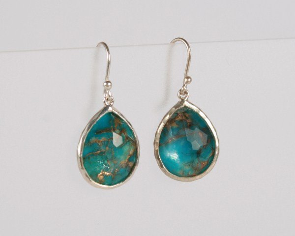 Ippolita Wonderland Teardrop Earrings: Ippolita Wonderland teardrop earrings. 20th century. Hammered sterling silver earrings set with turquoise crystal doublets. Total weight 5.0 grams.