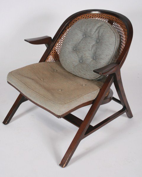 Edward Wormley Armchair, Model 5700-A: Edward Wormley armchair, model 5700-A. American, circa 1957. Made by Dunbar. Stained and lacquered wood frame having caned back and tufted upholstered seat and cushion. Signed with applied metal manuf