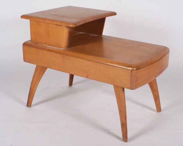 Heywood Wakefield End Table, 20th C.: Heywood Wakefield maple end table with Champagne finish. American, 20th century. Maple end table having stepped rectangular form and one drawer raised on four splayed and tapering legs. Stamped "Heywo