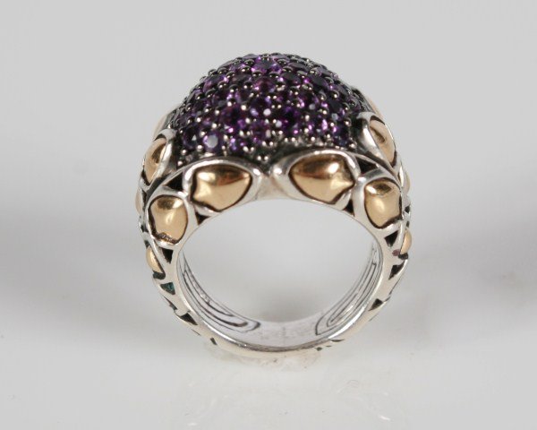 John Hardy Amethyst Dome Ring: John Hardy sterling silver and 18 karat gold ring set with amethyst. 20th century. Ring size 6. Total weight 14.6 grams.
