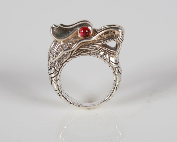 John Hardy Naga Dragon Head Ring: John Hardy Naga sterling silver dragon head ring set with white sapphires and ruby eyes. 20th century. Ring size 6. Total weight 15.0 grams.