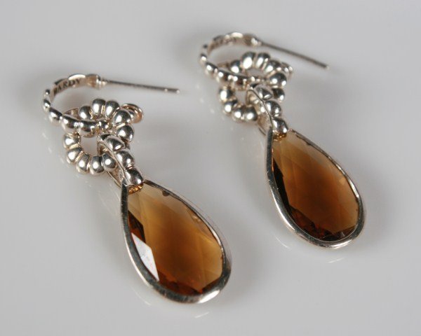 John Hardy Bedeg Batu Cognac Quartz Earrings: John Hardy Bedeg Batu sterling silver small hoop drop earrings set with cognac quartz.. 20th century. Total weight 9.4 grams.