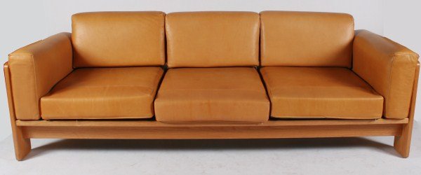 Tobia Scarpa Bastiano Sofa for Knoll: Tobia Scarpa "Bastiano" sofa. 20th century. Made by Knoll International. Sofa having wood frame and brown leather upholstered cushions. Height 28", width 83 1/4", depth 30". Provenance: From the Ray F