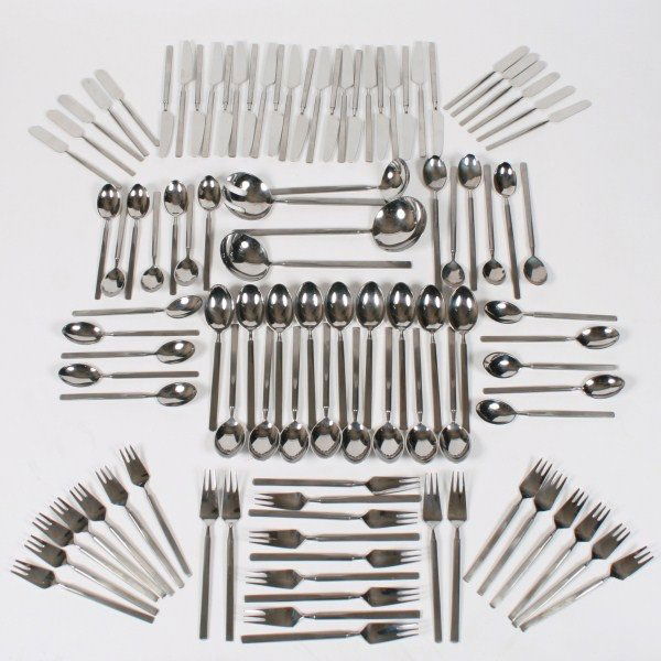 Erik Herlow Obelisk Stainless Steel Flatware Set: Erik Herlow stainless steel flatware set in the "Obelisk" pattern. 20th century. By Copenhagen Cutlery, Denmark. Having 102 pieces, including: 21 dinner knives; 13 dinner forks; 13 dessert forks; 11 b