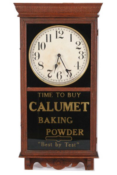 Sessions Calumet Baking Powder Advertising Clock: Sessions Calumet Baking Powder advertising 8-day clock. 20th century. Oak case clock with advertisement reading: "Time to Buy Calumet Baking Powder 'Best by Test'". Dial with Arabic numerals is marked