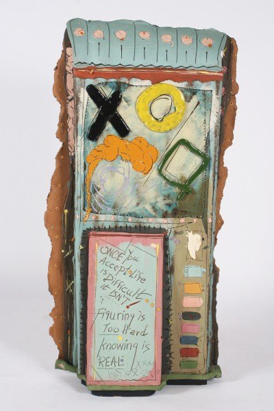 Don Reitz (1929-2014), Sculpture: Don Reitz (American, 1929-2014). Slip-painted, carved, and glazed earthenware sculpture. One side reads: "Once you accept life is difficult...it isn't! Figuring is too hard knowing is real." Other sid