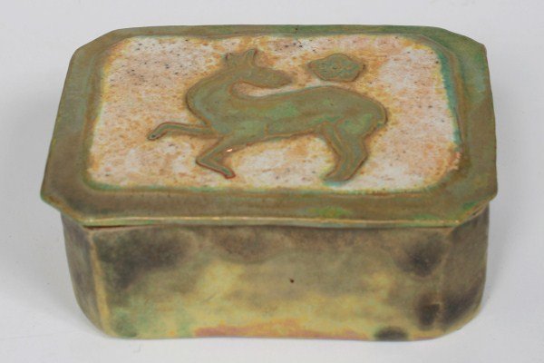 Pewabic Covered Cigarette Box: Pewabic pottery cigarette box. American, 20th century. Covered pottery cigarette box depicting a deer and a flower with an iridescent glaze. With impressed "Pewabic Detroit" mark to base. Height 1 7/8