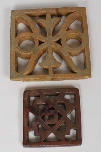 Pair of Pewabic Pottery Trivets: Pair of Pewabic pottery trivets. American, 20th century. Pair of Pewabic pottery trivets of varying sizes, the smaller of which has an iridescent glaze. Both trivets are unmarked. Larger trivet 8 5/8"