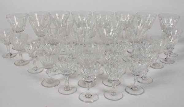 36-Piece Set of Baccarat Port and Cordial Glasses: 36-piece set of Baccarat crystal port and cordial glasses. French, 20th century. All glasses with acid etched Baccarat France circular mark to base. Height of port glasses 4 1/2", height of cordial gl