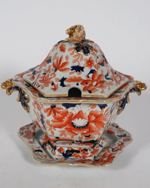 Mason Ironstone Tureen: Mason Ironstone covered tureen. 19th century. In the Imari pattern. Having an openwork base, floral and leaf design, and a hexagonal tray. Height 14". Provenance: From the Estate of Stephen Stackpole.