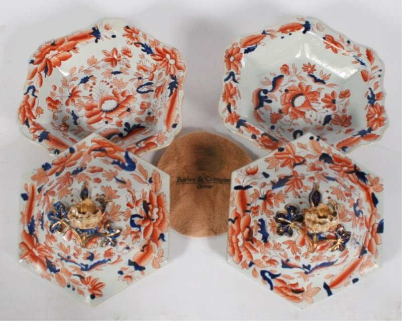Pair of Mason Ironstone Vegetable Dishes: Pair of Mason Ironstone covered vegetable dishes. Circa 1830. In the Imari pattern. Having openwork bases, floral and leaf designs, and floral finial tops. Height 8". Provenance: From the Estate of St