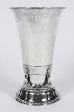 Georg Jensen Sterling Silver and Moonstone Vase: Georg Jensen sterling silver and moonstone vase. Danish, circa 1930. Sterling silver vase decorated with four stylized dolphins and oval moonstones to each dolphin tail. With manufacturer's hallmark a