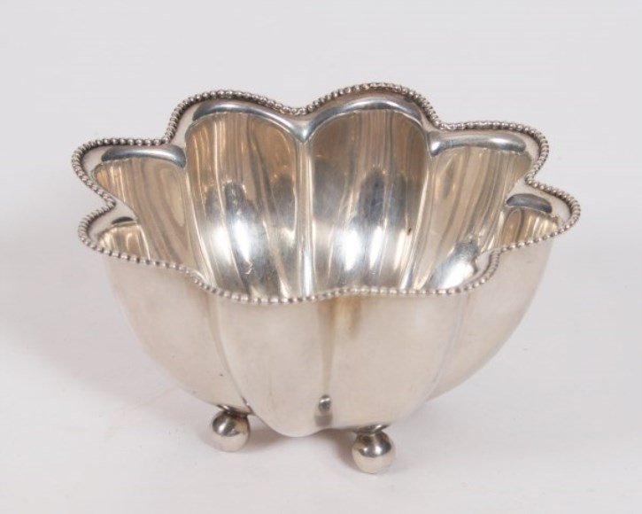 H. Kohn & Sons Sterling Silver Footed Bowl: H. Kohn & Sons sterling silver footed bowl. American, 20th century. Fluted bowl raised on four ball feet and having beaded edge to rim. With maker's mark and numbered "4666" to underside. Height 2 3/8