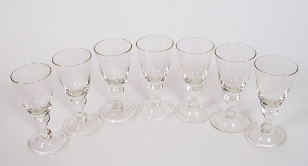 Set of Seven Hand-blown Cordial/Wine Glasses: Set of seven hand-blown cordial/wine glasses. Unmarked. Height 6". Provenance: From the Estate of Marylin B. Morison
