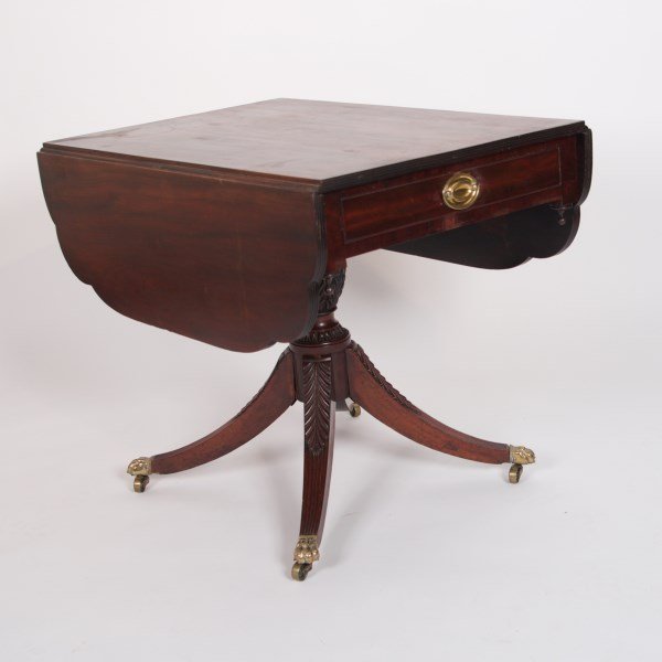 Federal Mahogany Drop-leaf Breakfast Table: Federal mahogany drop-leaf breakfast table. American, probably New York, early 19th century. School of Duncan Phyfe. The rectangular drop-leaf top, over a single frieze drawer to one end and one false