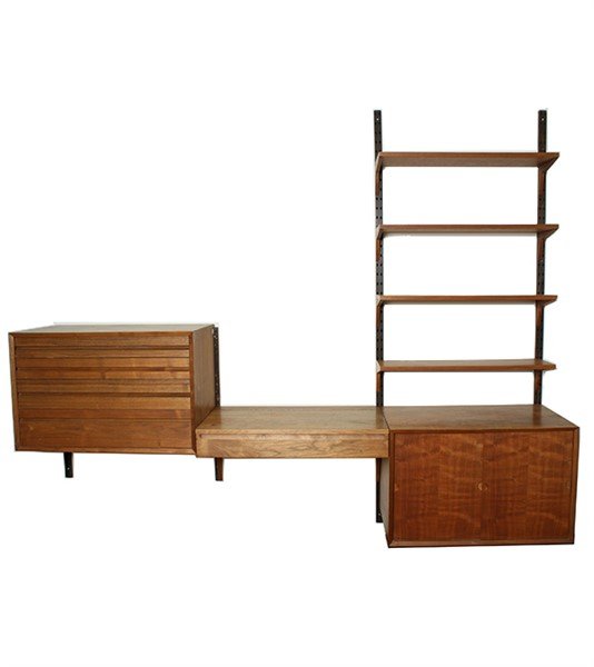 Poul Cadovius for Cado Wall Unit: Poul Cadovius for Cado Danish, circa 1960 Teak wood The unit is a customizable system which mounts to the wall with metal brackets. Unit includes teak shelves and table panel equipped with hinged top