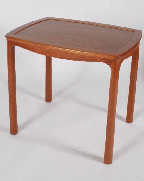 Edward Wormley Occasional Table: Edward Wormley wood occasional table, number 6326 American, 20th century Height 25 1/4", Width 28 1/8", Depth 21 1/8" Made by Dunbar. Wood occasional table having a rounded rectangular top raised on f