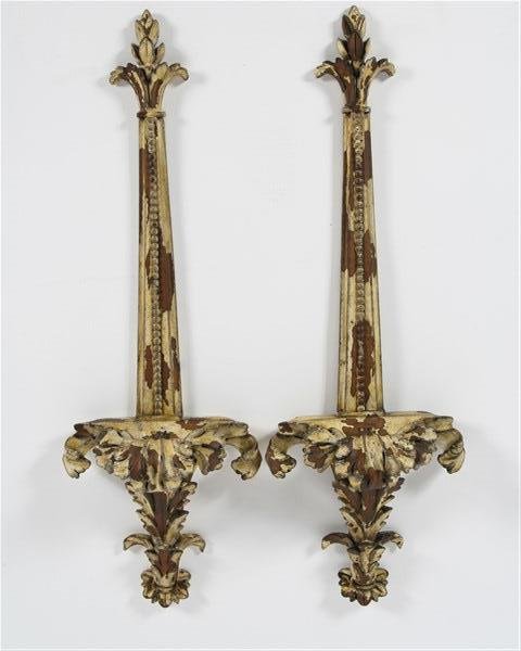 Pair of Acanthus Wall Appliques: Two wall appliques 28.5" x 10" each French-styled acanthus leaf design wooden wall appliques. Antique finish. Stamped "7031 Design Source ©1999" on front.