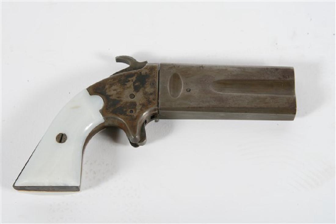 "Twister" Classic Arms Replica Kit Pistol: Twister" kit pistol from Classic Arms American made Length: 7.25" Assembled kit pistol from Classic Arms. Model: "Twister." Pivoting barrel. .36 caliber. Imitation ivory grips. Bottom of grip engraved
