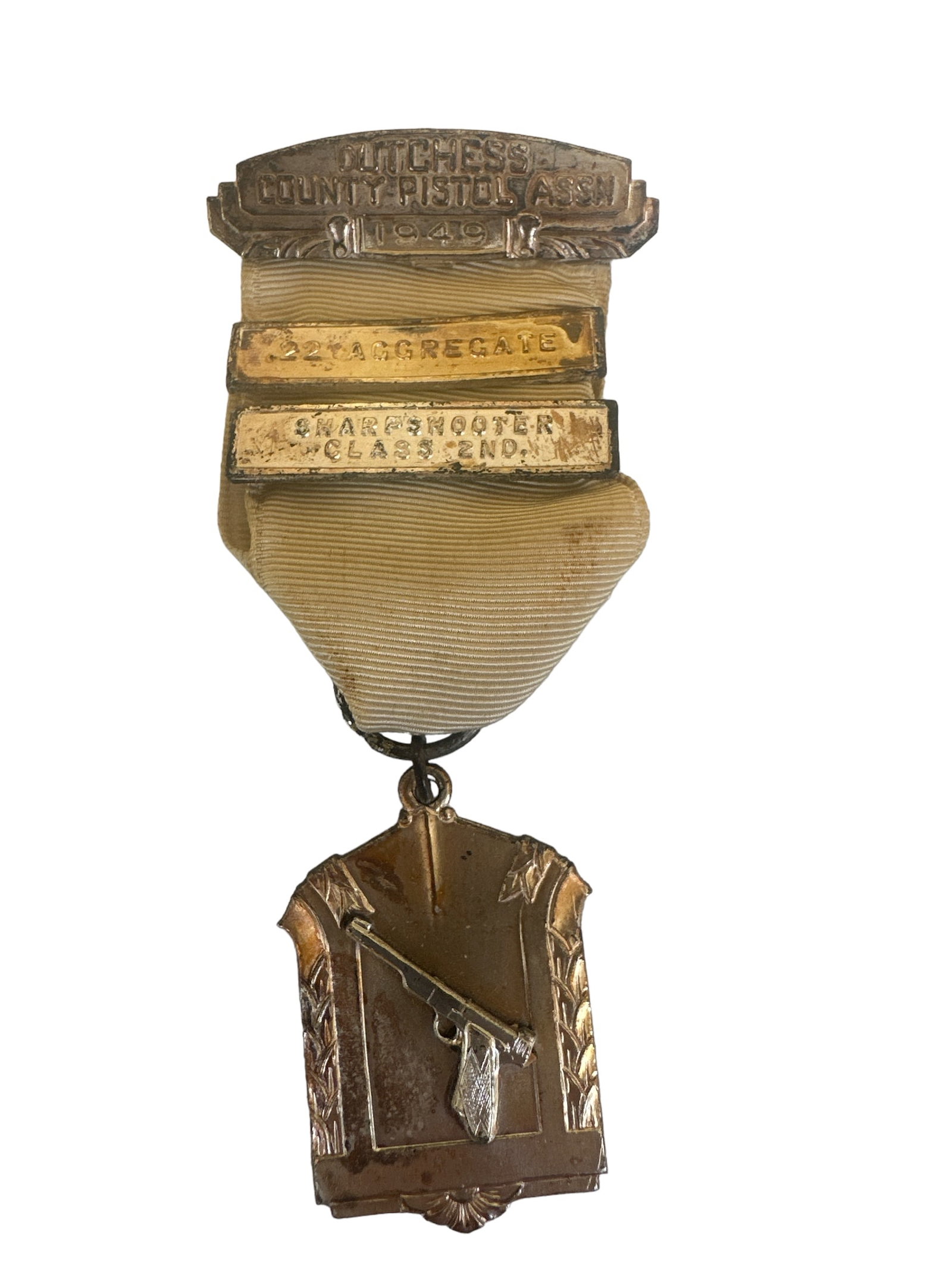 Vintage 1949 DUTCHES COUNTY PISTOL ASSN Medal. .22 Aggregate . SHARPSHOOTER CLASS 2ND.: The Vintage 1949 Dutches County Association Medal for .22 Aggregate. SHARPSHOOTER CLASS 2ND. is a prestigious award that exemplifies exceptional marksmanship from the mid-20th century. Awarded by Pist