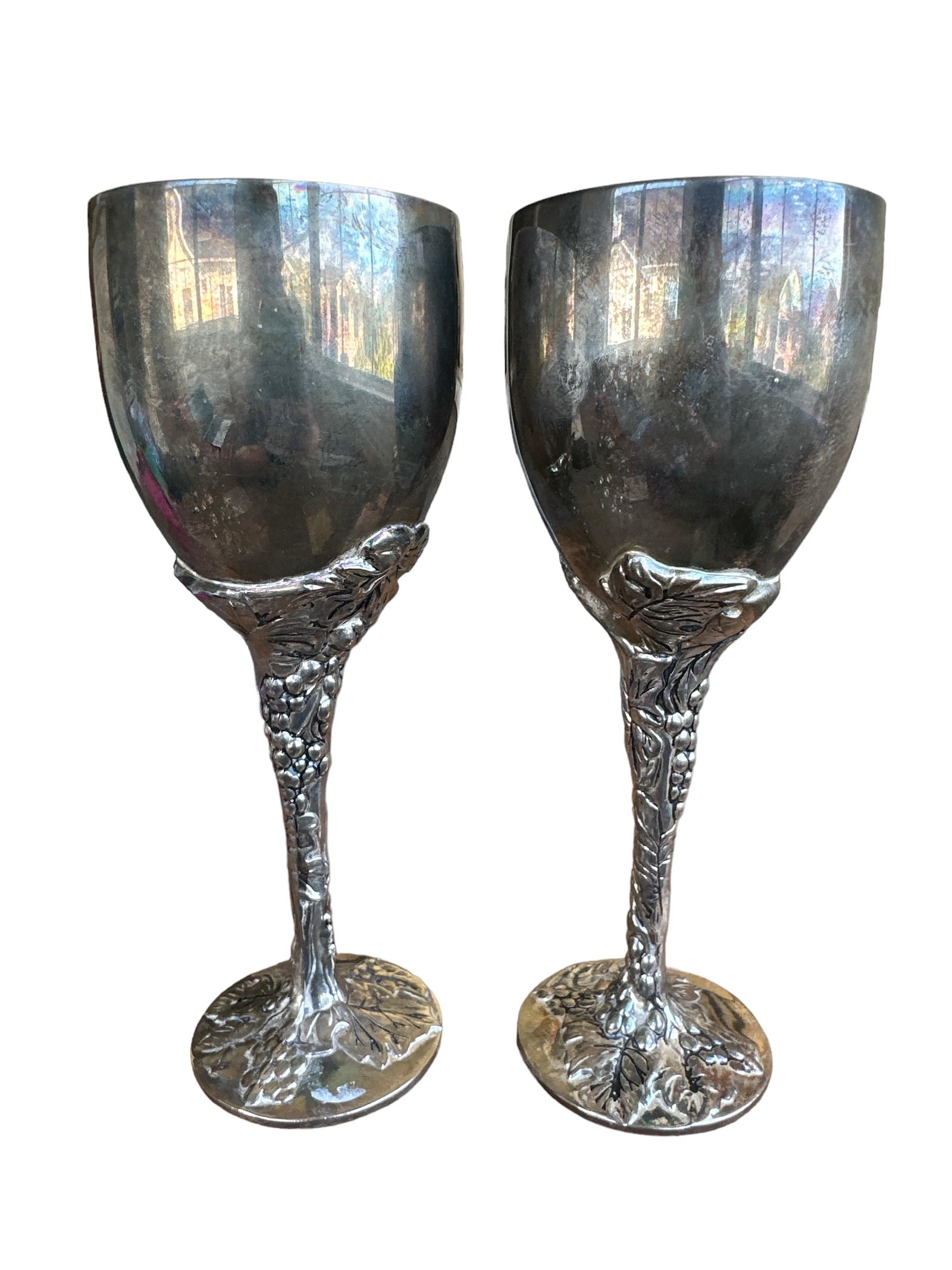 Set of 2 Vintage Godinger Silver Plated Wine Cup with Grape Design: This set includes two vintage wine cups from Godinger, crafted from silver-plated metal and featuring an elegant grape design. Ideal for collectors or for adding a touch of classic sophistication to a