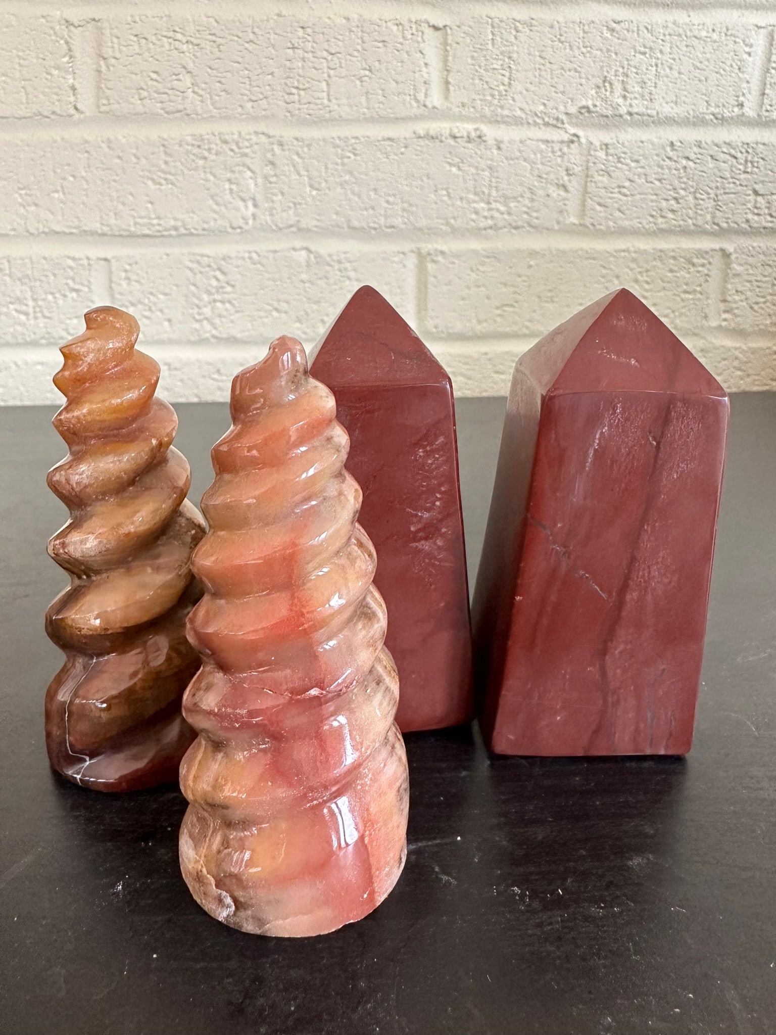 Lot of 4 Red Jasper and Chocklate Calcite Towers 2 lbs: Lot of 4 Red Jasper and Chocklate Calcite Towers 2 lbs. This set of 2 towers, sourced from Afghanistan, showcases stunning natural patterns and colors. Perfect for crystal collections, home décor, or