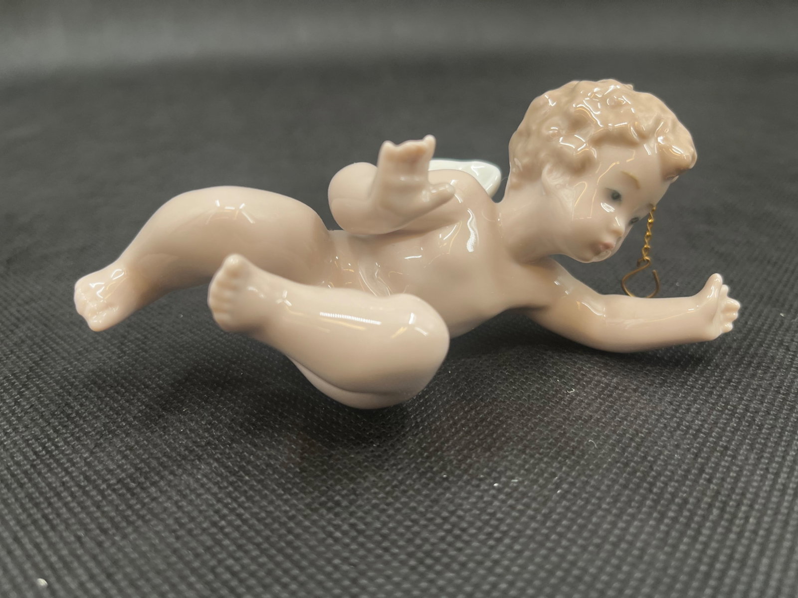 Lladro Porcelain Surprised Cherubs QTY: TWO: Lladro Porcelain Surprised Cherubs QTY: TWO Lladro Porcelain Surprised Cherubs # 06253 Made in Spain Dimensions: 5”H x 3”W With Original Boxes